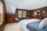 This bedroom has great views of the lake and direct access to the bathroom